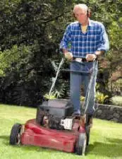 man mowing grass